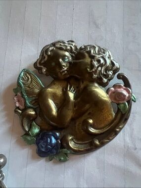 Vintage Bronze Cherub  brooch, pin with Pastel Floral Accents.